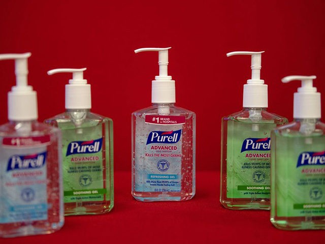 This photo illustration shows bottles of Purell hand sanitizers on March 5, 2020 in Washington,DC. - Amazon pledged on March 5, 2020 to take steps to fight price gouging after a US senator complained of "unjustifiably high prices" on hand sanitizers and surgical masks to protect against coronavirus infections. The …
