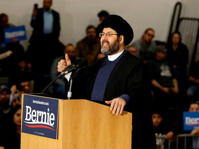 Imam Al-Hasan Qazwini from the Islamic Institute of America, speaks during a campaign rall