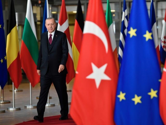 Turkish President Recep Tayyip Erdogan arrives before a meeting with European Commission P