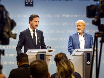 Dutch Prime Minister Mark Rutte (L) speaks past director of the Center for Infectious Disease Control at RIVM Jaap van Dissel during a press conference at the Ministry of Justice and Security in the Hague, The Netherlands, on March 9, 2020, after a crisis meeting on the spread of the …