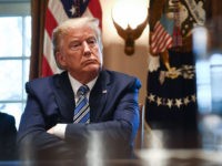 TOPSHOT - US President Donald Trump speaks during a meeting with banking leaders to discuss how the financial services industry can meet the needs of customers affected by COVID-19 at the White House in Washington, DC on March 11, 2020. (Photo by Brendan Smialowski / AFP) (Photo by BRENDAN SMIALOWSKI/AFP …