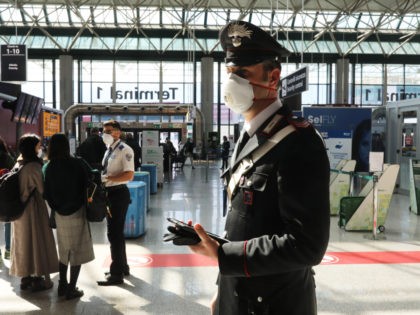 ROME, ITALY - MARCH 12: A Carabinieri Paramilitary Police Officer wearing a protective mas