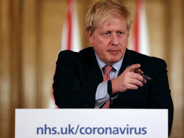 Britain's Prime Minister Boris Johnson speaks at a news conference addressing the government's response to the novel coronavirus COVID-19 outbreak, at 10 Downing Street in London on March 12, 2020. - Britain on Thursday said up to 10,000 people in the UK could be infected with the novel coronavirus COVID-19, …
