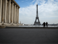 Policemen patrol on the Esplanade du Trocadero square near the Eiffel Tower in Paris, on March 17, 2020 in Paris as a strict lockdown comes into in effect in France to stop the spread of COVID-19, caused by the novel coronavirus. - A strict lockdown requiring most people in France …