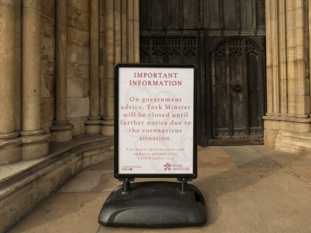 A notice outside York Minster informs members of the public that it has been closed in lig