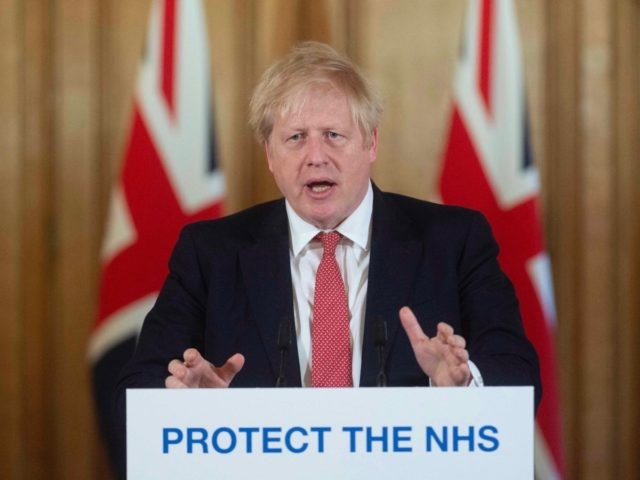 LONDON, ENGLAND - MARCH 20: British Prime Minister Boris Johnson gestures as he speaks dur