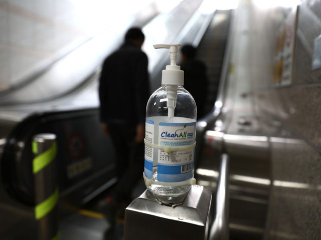 SEOUL, SOUTH KOREA - MARCH 13: Hand Sanitizer is seen at the escalator on March 13, 2020 in Seoul, South Korea. According to the Korea Center for Disease Control and Prevention 110 new cases were reported, with the death toll rising to 67. The total number of infections in the …