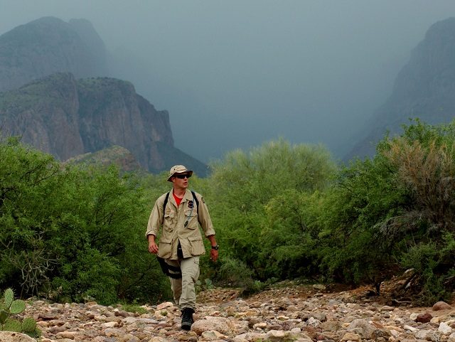 392795 20: US Border Patrol BORSTAR agent Scott Harper follows a group of turkey vultures