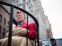 United States Marine Hershel "Woody" Williams, a Medal of Honor recipient and the last surviving member of the famous Iwo Jima flag raising photo, rides on a float during the Veteran's Day Parade on November 11, 2013 in New York City. The parade included members of all four branches of …