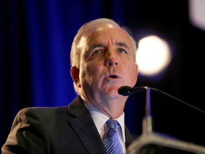 MIAMI BEACH, FL - OCTOBER 01: Carlos A. Gimenez, Mayor, Miami-Dade County speaks during the opening day of the 6th Annual Southeast Florida Climate Leadership Summit where South Florida community leaders along with climate change experts are meeting at the Miami Beach Convention Center to discuss regional plans for adapting …