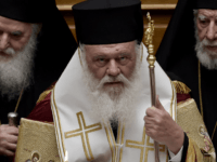 Greek Archbishop Ieronymos (C) looks on during the swearing in ceremony of the New Greek President Prokopis Pavlopoulos (Unseen) in the parliament in Athens on March 13, 2015. AFP PHOTO / POOL / ARIS MESSINIS (Photo credit should read ARIS MESSINIS/AFP via Getty Images)