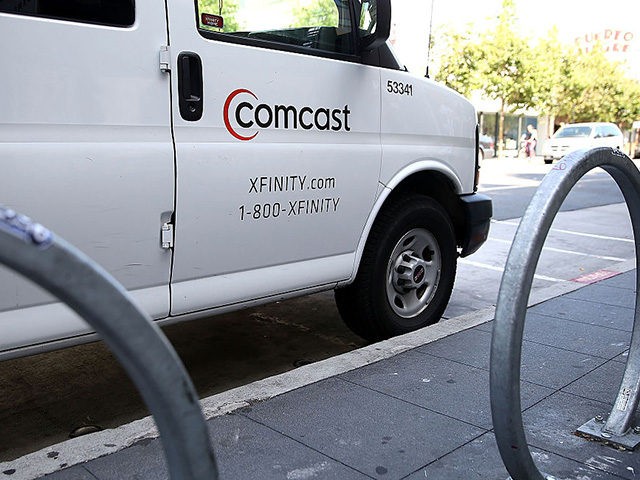 SAN FRANCISCO, CA - JULY 13: A Comcast service vehicle is seen parked on July 13, 2015 in San Francisco, California. Comcast announced plans to launch a streaming video service later this summer for Xfinity internet subscibers. The service called Stream will cost $15 a month. (Photo by Justin Sullivan/Getty …