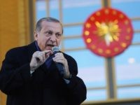 ANKARA, TURKEY - APRIL 17: Turkish President Tayyip Erdogan gives a referendum victory speech to his supporters at the Presidential Palace on April 17, 2017 in Ankara Turkey. Erdogan declared victory in Sunday's historic referendum that will grant sweeping powers to the presidency, hailing the result as a "historic decision. …