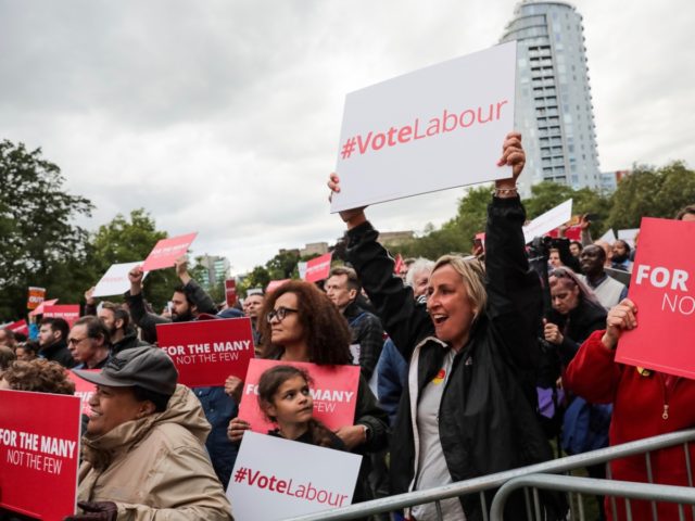 CROYDON, ENGLAND - JUNE 06: Supporters cheer during a Labour Party rally in Park Hill park on June 6, 2017 in Croydon, England. Labour Leader Jeremy Corbyn appears via satellite to five separate rallies across the country this evening. Tomorrow marks the final day of campaigning for the political parties …