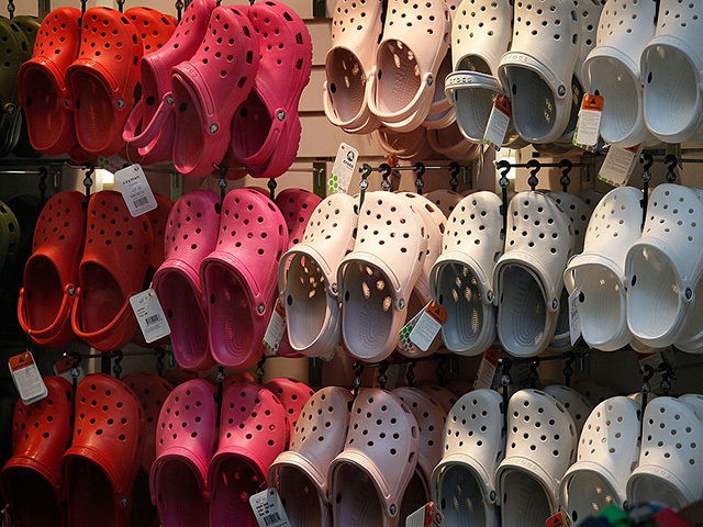CHICAGO - JULY 23: Crocs footwear is displayed in one of the company's retail stores July 23, 2009 in Chicago, Illinois. The struggling shoe manufacturer went public in 2006 and has since seen its stock price plummet from more than $70 a share to about $3 a share. (Photo by …