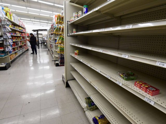 Grocery store shelf empty (Frederic J. Brown / AFP / Getty)