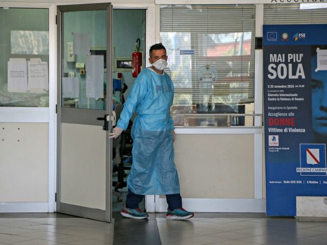 A hospital worker is pictured at the emergencies department of the Cardarelli hospital in Naples on March 11, 2020, a day after Italy imposed unprecedented national restrictions on its 60 million people on March 10 to control the deadly coronavirus. - Its a race against time at the Cardarelli hospital …