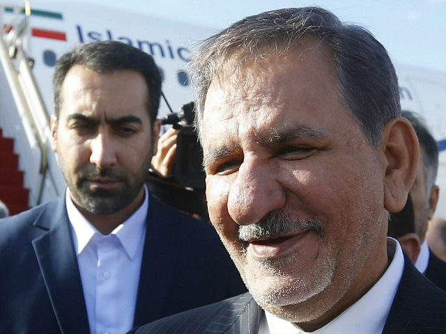 Iran's Vice President Eshaq Jahangiri walks off the air plane that flew him to Syria upon his arrival at Damascus airport on January 28, 2019. (Photo by LOUAI BESHARA / AFP) (Photo credit should read LOUAI BESHARA/AFP via Getty Images)