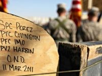 In this Dec. 17, 2011 photo, soldiers from the 3rd Brigade, 1st Cavalry Division, attend a casing of the colors ceremony by handwritten names of soldiers at Camp Adder, now known as Imam Ali Base, near Nasiriyah, Iraq. Around 500 troops from the 3rd Brigade, 1st Cavalry Division ended their …