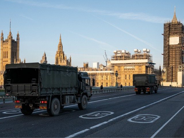 LONDON, UNITED KINGDOM - MARCH 24: Military vehicles cross Westminster Bridge after member