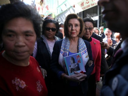 U.S. Speaker of the House Rep. Nancy Pelosi (C) (D-CA) tours San Francisco's Chinatown on