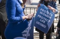 WASHINGTON, DC - MARCH 04: Pro-life activists participate in a rally outside of the Supreme Court as the justices hear oral arguments in the June Medical Services v. Russo case on March 4, 2020 in Washington, DC. The Louisiana abortion case is the first major abortion case to make it …