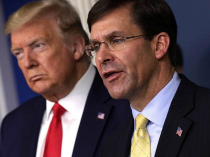 WASHINGTON, DC - MARCH 18: U.S. Secretary of Defense Mark Esper speaks as President Donald Trump listens during a news briefing on the latest development of the coronavirus outbreak in the U.S. at the James Brady Press Briefing Room at the White House March 18, 2020 in Washington, DC. President …
