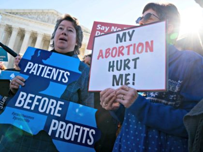 WASHINGTON, DC - MARCH 04: Pro-life activists participate in a rally outside of the Suprem