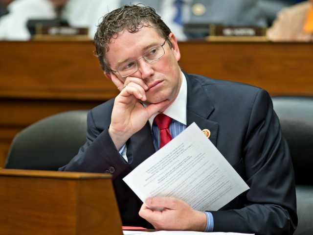 House Oversight Committee member Rep. Thomas Massie, R-Ky., listens during a politically c