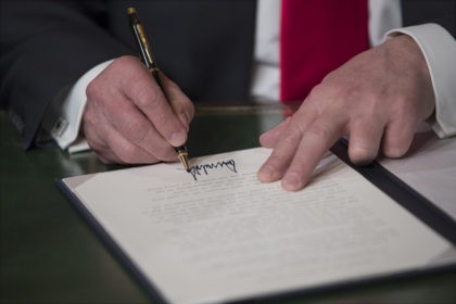 WASHINGTON, DC - JANUARY 20: President Donald Trump formally signs his cabinet nominations into law, in the PresidentÕs Room of the Senate, at the Capitol in Washington, January 20, 2017. (Photo by J. Scott Applewhite - Pool/Getty Images)