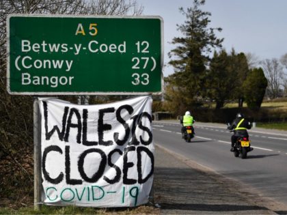 A handmade sign attatched to a road sign near the village of Cerrigydrudion in north Wales