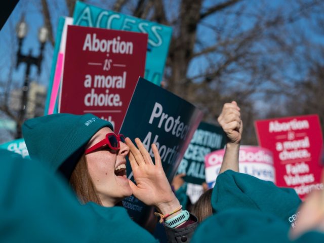 WASHINGTON, DC - MARCH 04: A person shouts slogans in an abortion rights rally outside of