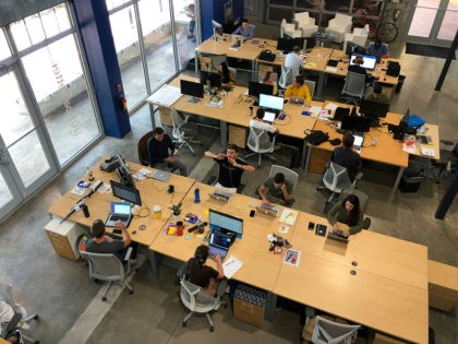 Staff at work in the Boatsetter office, a South Florida based boat-renting tech company on August 7, 2019 in Fort Lauderdale, Florida. - Strategically positioned, South Florida is a growing hub for startups and tech companies where unicorns are called, at least by one of the accelator companies in the …