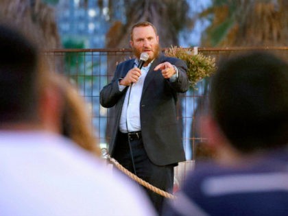 Rabbi Shmuley Boteach, father of Chana Boteach, who runs a kosher sex shop in the Israeli coastal city of Tel Aviv, speaks during a conference on "kosher sex" on August 29, 2019. - Behind what seems to be a nice clothing shop, the Rabbi's daughter sells sex toys and books …