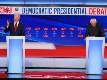 Democratic presidential hopefuls former US vice president Joe Biden (L) and Senator Bernie