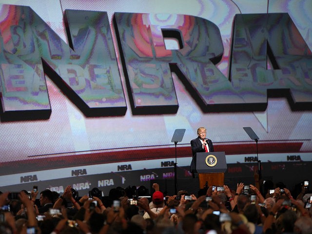 FILE - In this April 28, 2017 file photo, President Donald Trump speaks during the National Rifle Association-ILA Leadership Forum, in Atlanta. As NRA prepares to gather for its 147th annual meeting in Dallas, the political landscape has changed considerably in the past year. Even with a GOP-led Congress and …