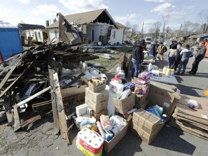 Household supplies are set up at a distribution center next to damaged homes Friday, March 6, 2020, in Nashville, Tenn. Residents and businesses face a huge cleanup effort after tornadoes hit the state Tuesday. (AP Photo/Mark Humphrey)