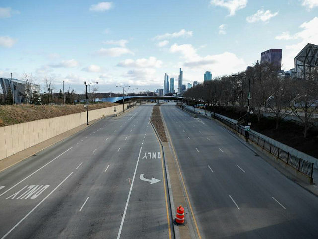 Columbus Drive is seen empty in downtown Chicago, Illinois, on March 21, 2020. - Almost on