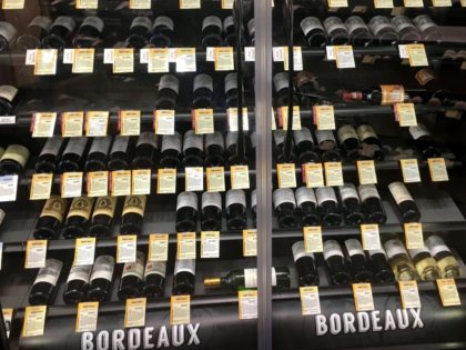 Bottles of French wine are displayed for sale in a liquor store on December 3, 2019 in Arlington, Virginia. - The United States on December 2, 2019 threatened to impose tariffs of up to 100 percent on $2.4 billion in French goods in retaliation for a digital services tax it …