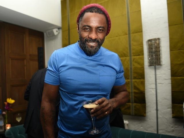BERLIN, GERMANY - FEBRUARY 22: Idris Elba enjoying a Grey Goose Espresso Martini cocktail during the Grey Goose after-party for Idris Elba's film 'Yardie', hosted at Soho House Berlin on February 22, 2018 in Berlin, Germany. (Photo by Zacharie Scheurer/Getty Images for Grey Goose Vodka)