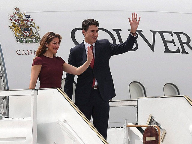 Canada's Prime Minister Justin Trudeau and first lady Sophie Gregoire wave on their arriva