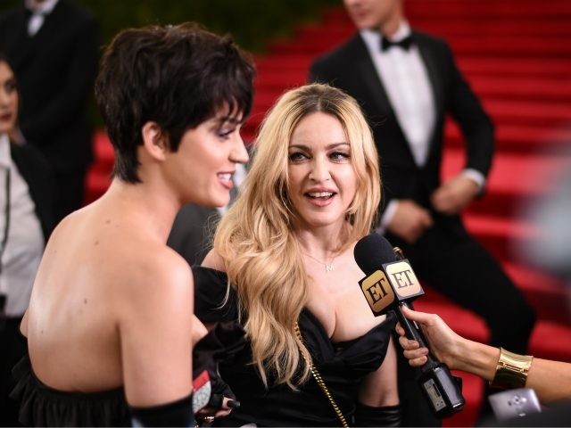 NEW YORK, NY - MAY 04: Singers (L-R) Katy Perry and Madonna attend the "China: Through The Looking Glass" Costume Institute Benefit Gala at the Metropolitan Museum of Art on May 4, 2015 in New York City. (Photo by Andrew H. Walker/Getty Images for Variety)