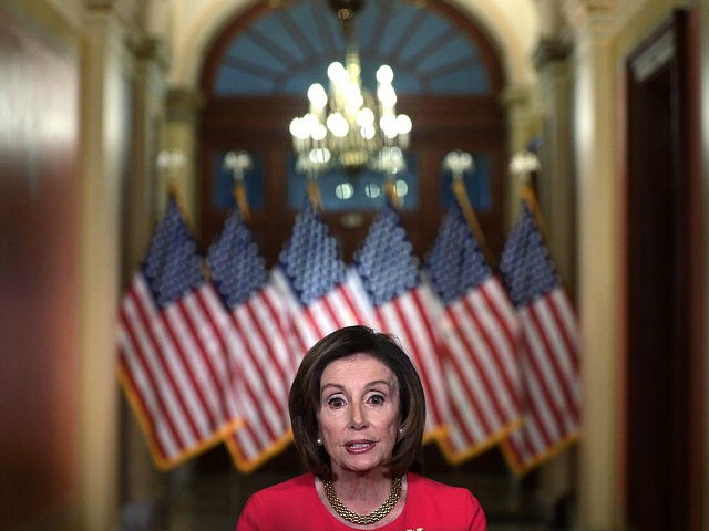 WASHINGTON, DC - MARCH 23: U.S. Speaker of the House Rep. Nancy Pelosi (D-CA) delivers a statement at the hallway of the Speaker’s Balcony at the U.S. Capitol March 23, 2020 in Washington, DC. Speaker Pelosi spoke on the 10th anniversary of the Affordable Care Act and introduced the Take …