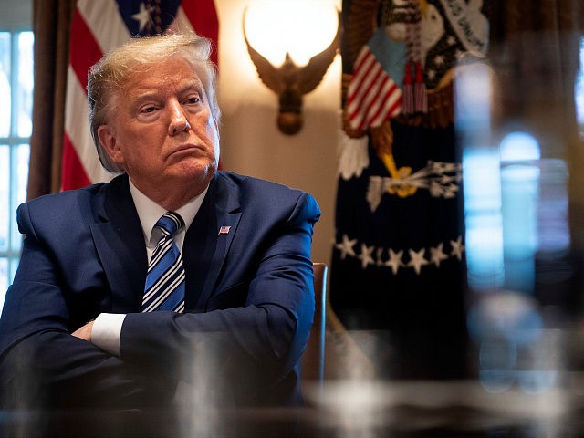 US President Donald Trump pauses while speaking to the press after a meeting with banking executives in the Cabinet Room of the White House March 11, 2020, in Washington, DC. (Photo by Brendan Smialowski / AFP) (Photo by BRENDAN SMIALOWSKI/AFP via Getty Images)