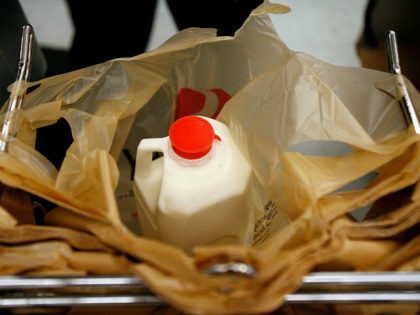 WASHINGTON - AUGUST 20: A half gallon of milk sits in a plastic bag at a Safeway grocery store August 20, 2007 in Washington, DC. The U.S. Labor Department released inflation data showing that U.S. food prices rose by 4.2 percent for the 12 months ending in July. According to …