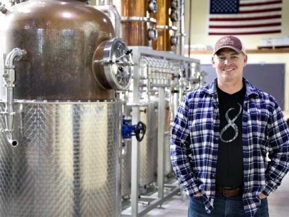 Chad Butters, founder of Eight Oaks Farm Distillery, poses for a photo at their facility in New Tripoli, Pa., Monday, March 16, 2020.Matt Rourke / AP