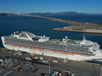 OAKLAND, CALIFORNIA - MARCH 10: Passengers disembark from the Princess Cruises Grand Princess cruise as it sits docked in the Port of Oakland on March 10, 2020 in Oakland, California. Passengers are slowly disembarking from the Princess Cruises Grand Princess a day after it docked at the Port of Oakland. …