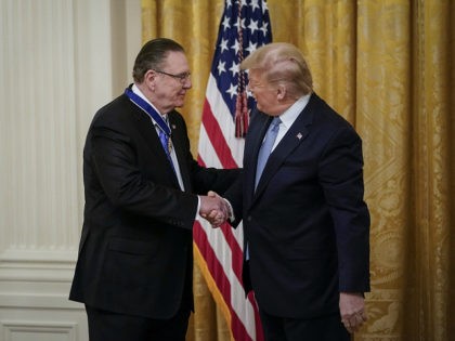 WASHINGTON, DC - MARCH 10: U.S. President Donald Trump (R) shakes hands with retired four-star Army general Jack Keane after presenting him with the Presidential Medal of Freedom to during a ceremony in the East Room of the White House March 10, 2020 in Washington, DC. Gen. Keane currently works …