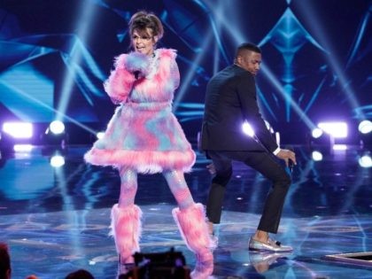 Sarah Palin and Host Nick Cannon on The Masked Singer. FOX