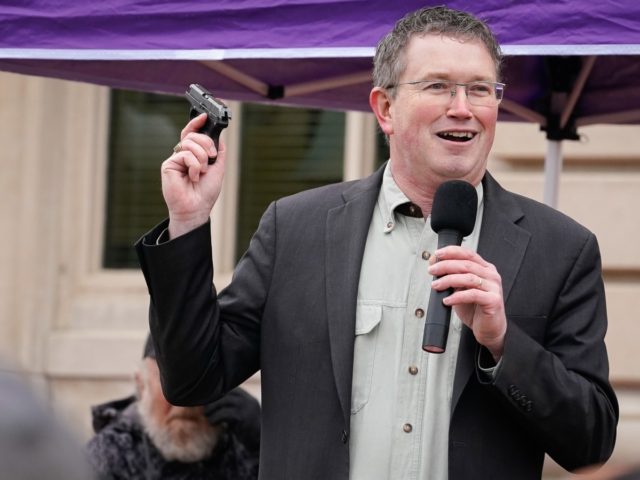 FRANKFORT, KY - JANUARY 31: Rep Thomas Massie (R-KY) draws a Ruger LCP handgun from his po